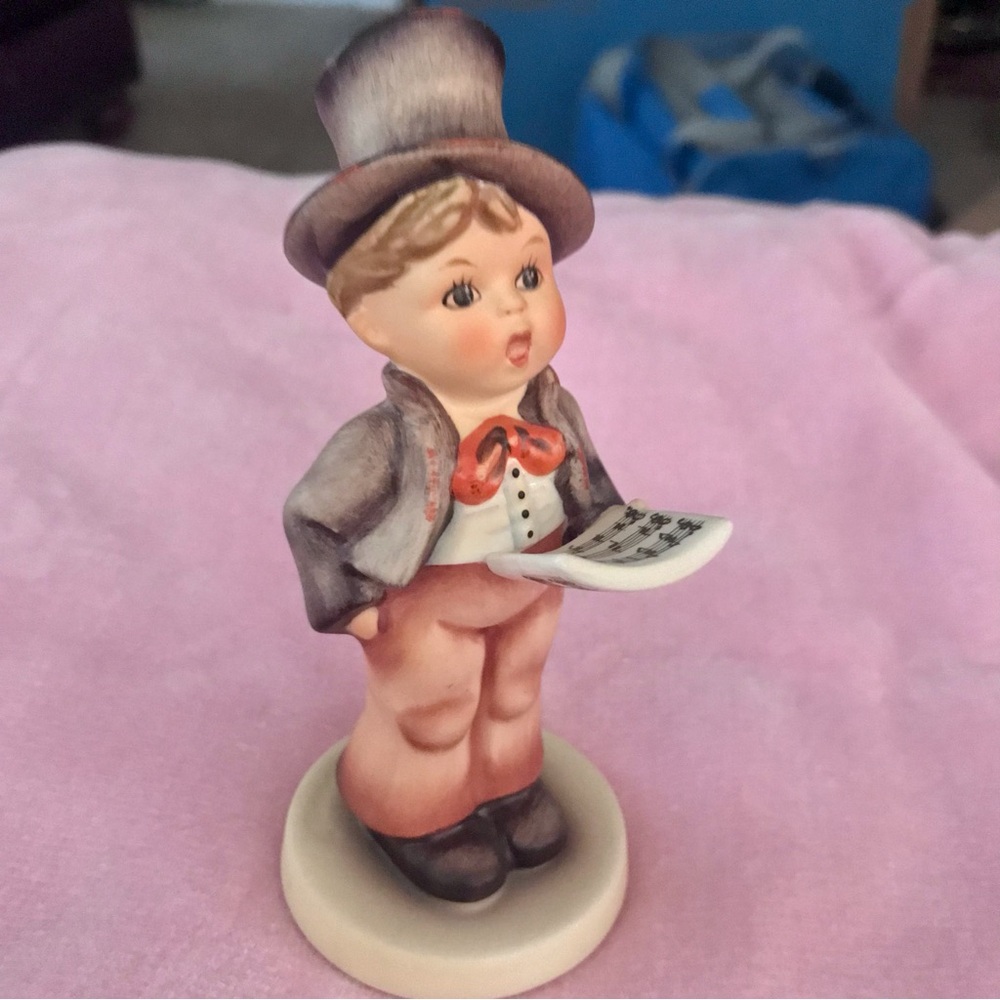Christmas Street Singer with Gray Hat and Red Accents